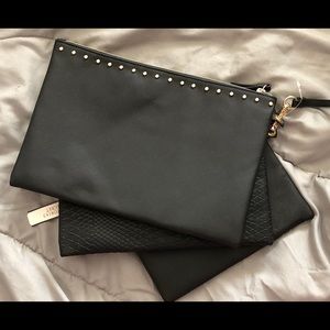 Victoria Secret’s trio wristlet black and gold